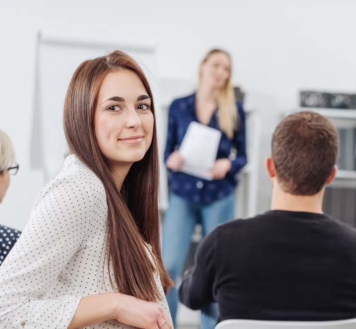 Foto einer Frau, die an einem Stotax Seminar teilnimmt