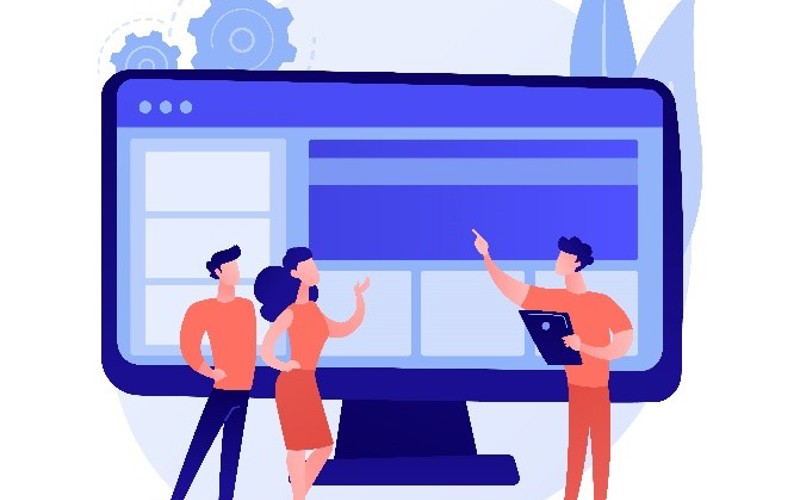 Team arbeitet an Gestaltung und Entwicklung einer Softwareoberfläche am Bildschirm.
